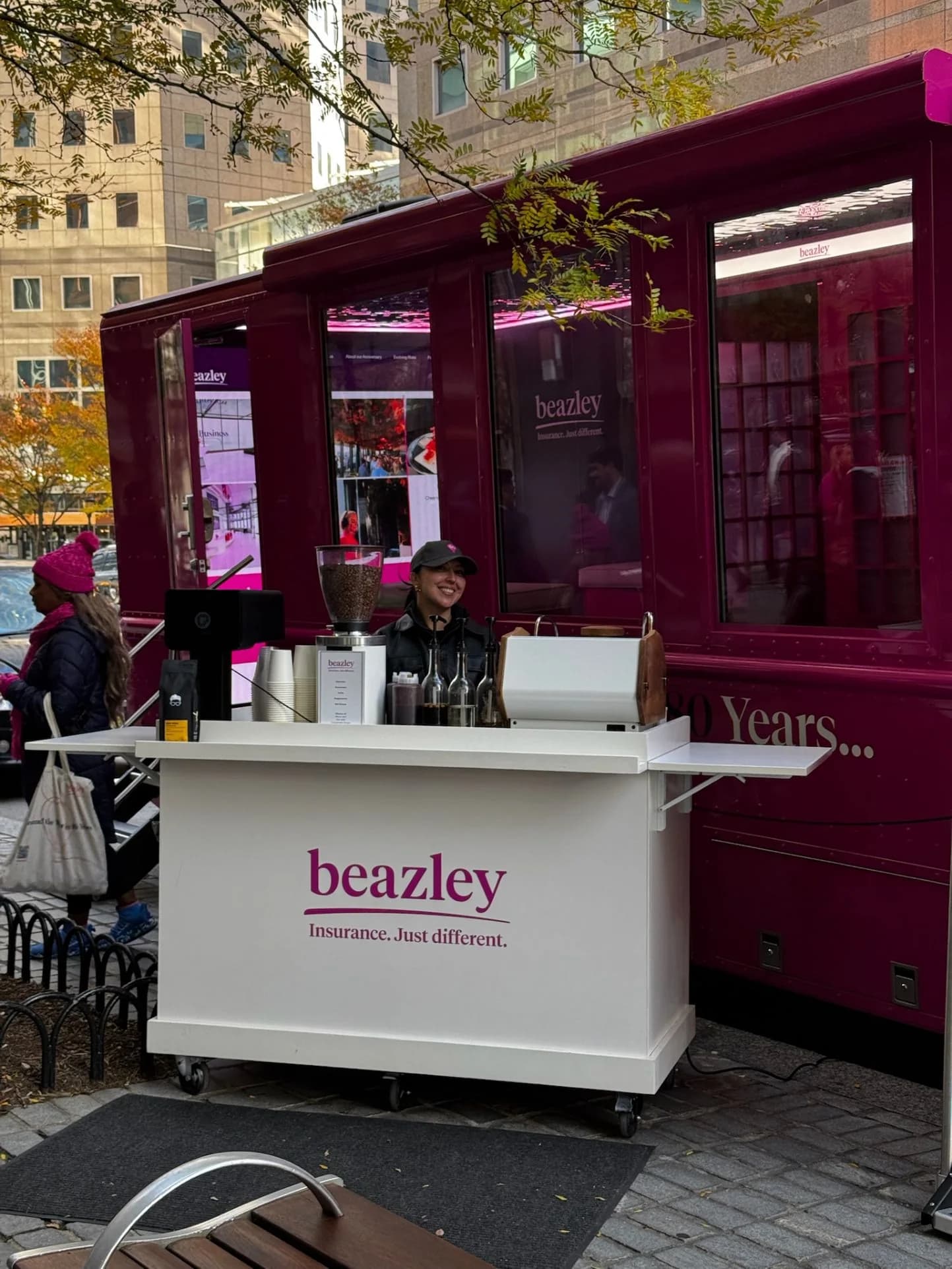 Attendees being served quickly at a high-volume conference coffee catering station