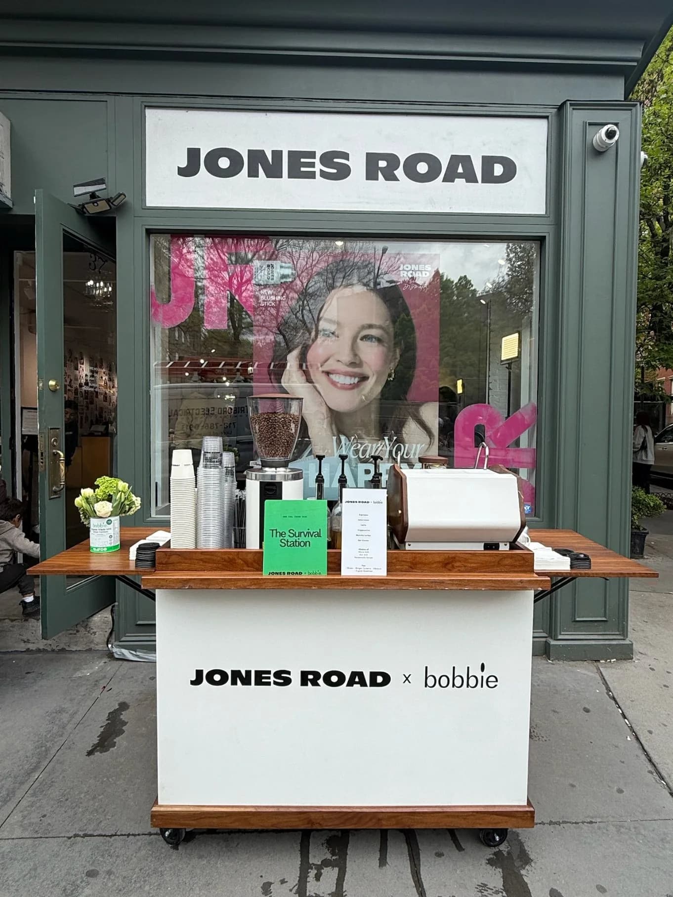 Co-branded Anechó coffee cart set up outside a New York storefront for a beauty product launch
