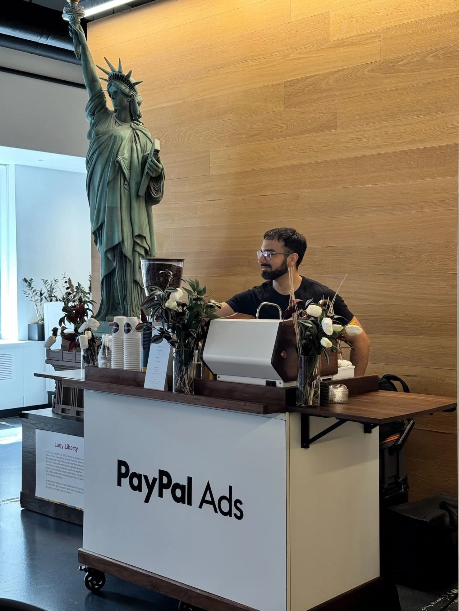Sponsor-branded coffee bar activation at a corporate expo
